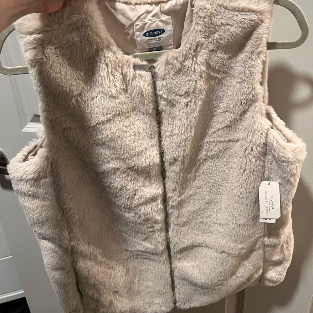 New w tags vest